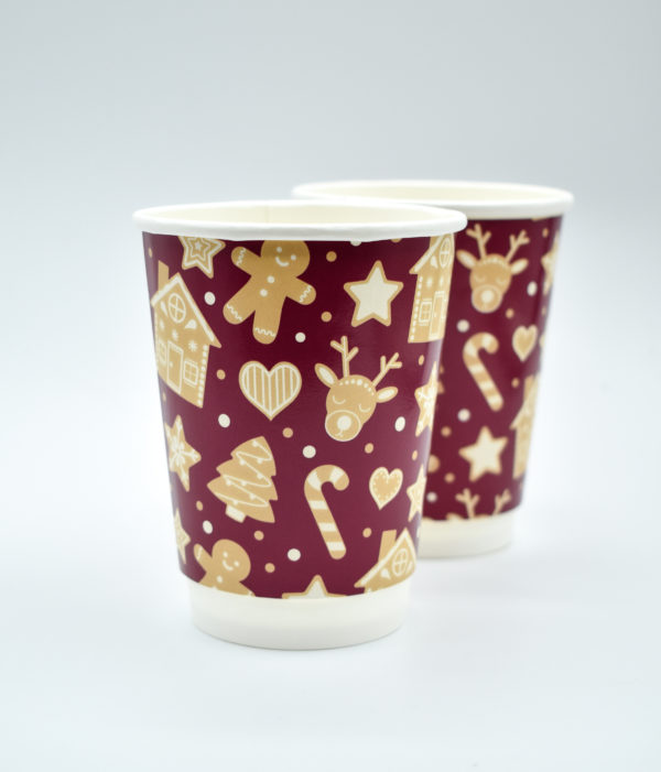 Christmas-themed paper cup featuring a rich burgundy background adorned with a playful gingerbread pattern. The design includes gingerbread men, candy canes, and holiday accents, creating a festive and cozy feel ideal for holiday celebrations.