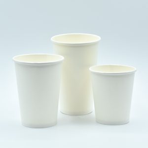 Three eco-friendly single-wall paper cups with an aqueous lining, designed to be biodegradable, recyclable, and plastic-free. These sustainable cups provide a greener alternative for serving cold drinks