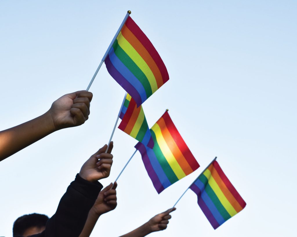 PRIDE FLAGS WAVING IN SKY LGBTQIA+ PAPER CUPS RAINBOW